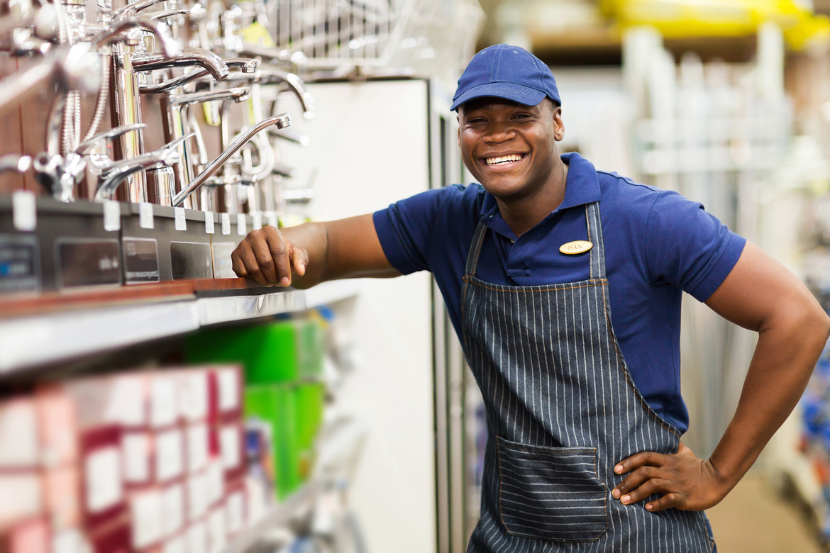 cheerful african hardware store worker